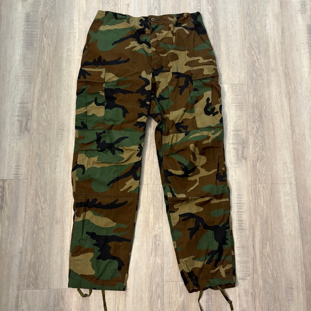 U.S. military Battle Dress Uniform (BDU) cargo pants with Woodland camouflage